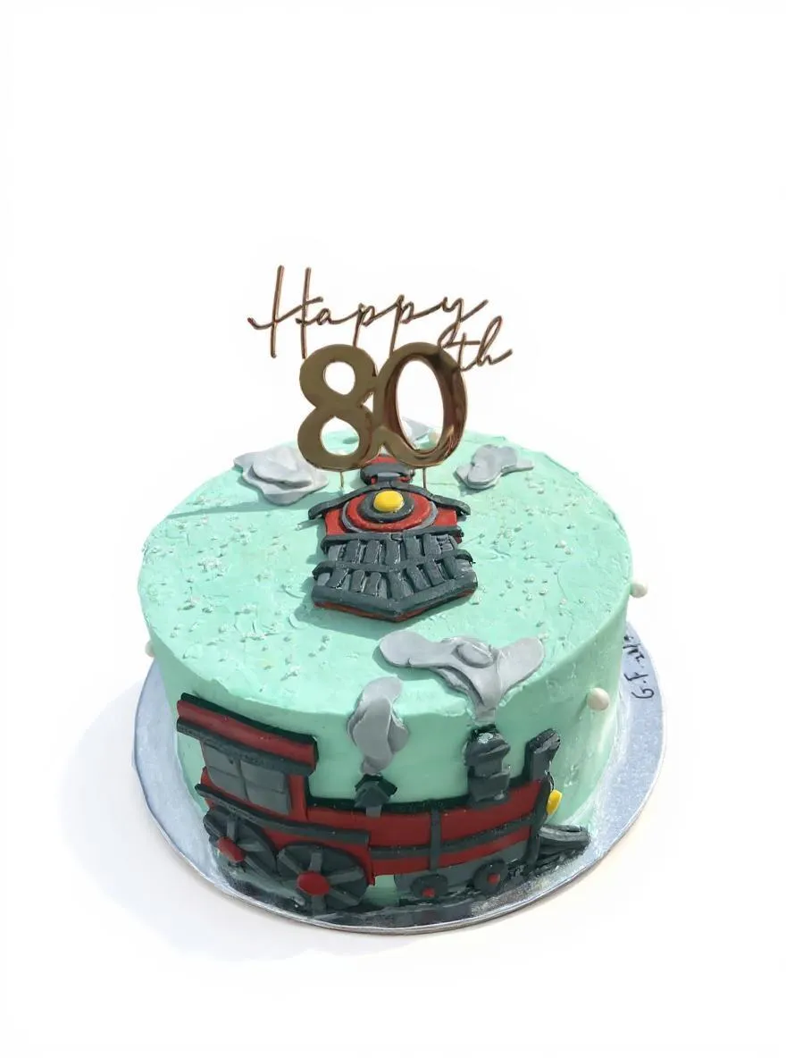 Train themed 80th birthday cake with locomotive decorations