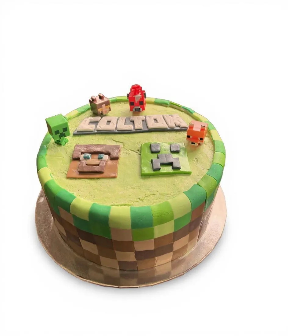 Minecraft themed round cake with character toppers