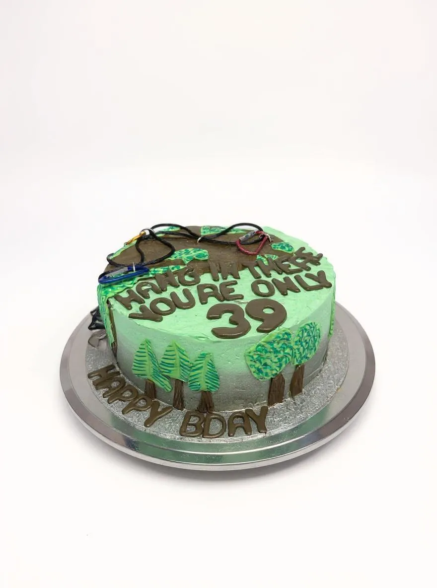 Hunting themed 29th birthday cake with forest and wildlife decorations