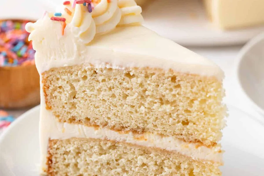 Slice of classic vanilla layer cake